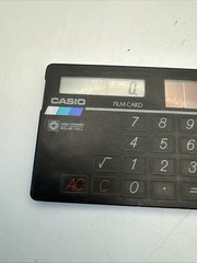 Casio Card FM Radio/Solar Calculator w/ headset (RD-90) 1988 Rare vintage Japan