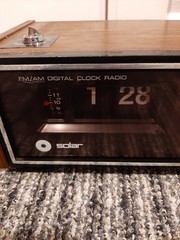 vintage Solar brand AM/FM digital flip clock radio, specifically Model DT-100