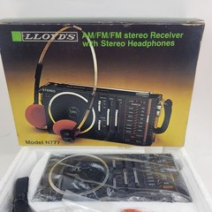 Lloyds Am/Fm Fm Stereo Receiver With Orange Stereo Headphones N777. New Vintage