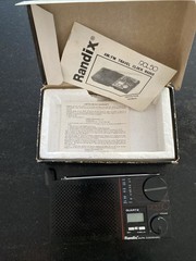 Vintage Randix RCL50 Travel AM/FM Quartz Clock Radio Pocket Size