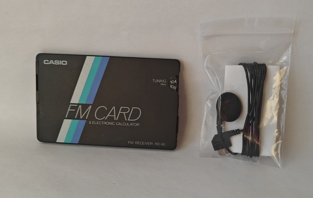 Casio Card FM Radio/Solar Calculator w/ headset (RD-90) 1988 Rare vintage Japan
