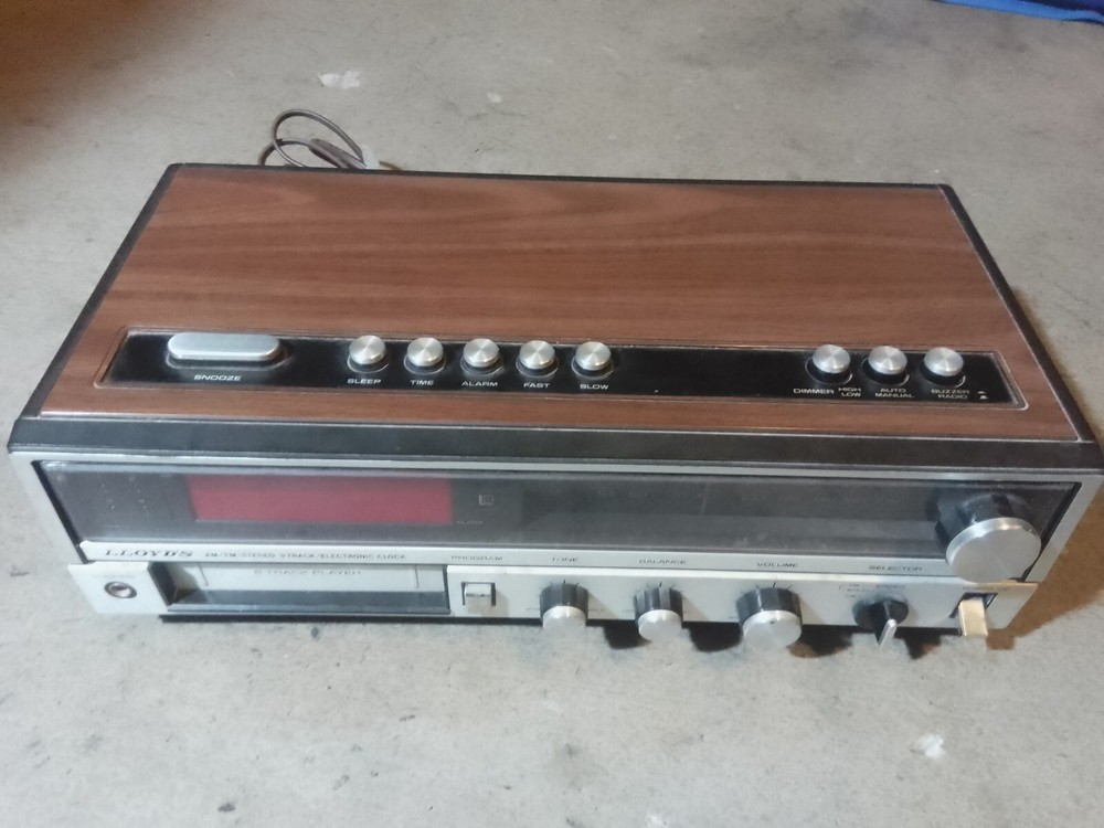 Lloyd&rsquo;s AM/FM Stereo 8 Track / Electronic Clock, Series 725A, Model J248
