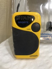 Vintage 80’s Citizen X189 AM/FM Portable Radio Yellow Headphones packaging