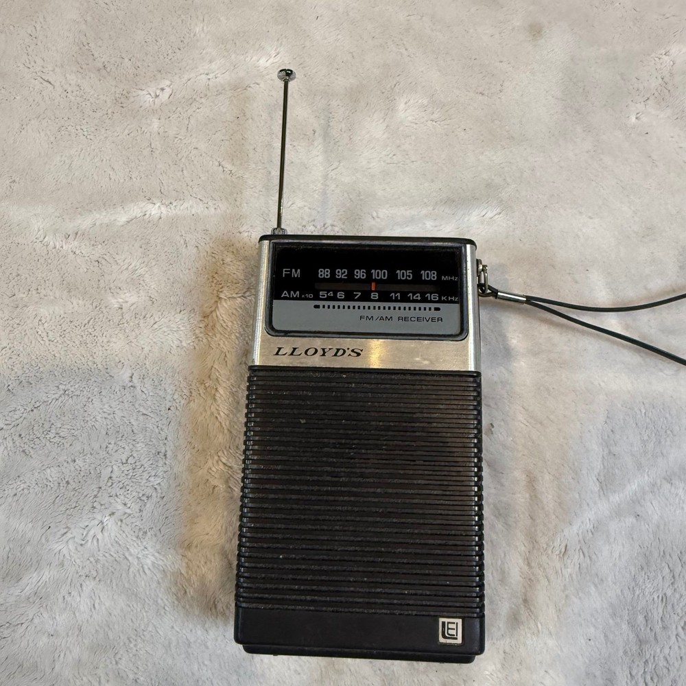 Vintage Lloyds N707 AM FM Portable Transistor Radio Series 724A Black Silver