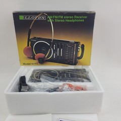 Lloyds Am/Fm Fm Stereo Receiver With Orange Stereo Headphones N777. New Vintage