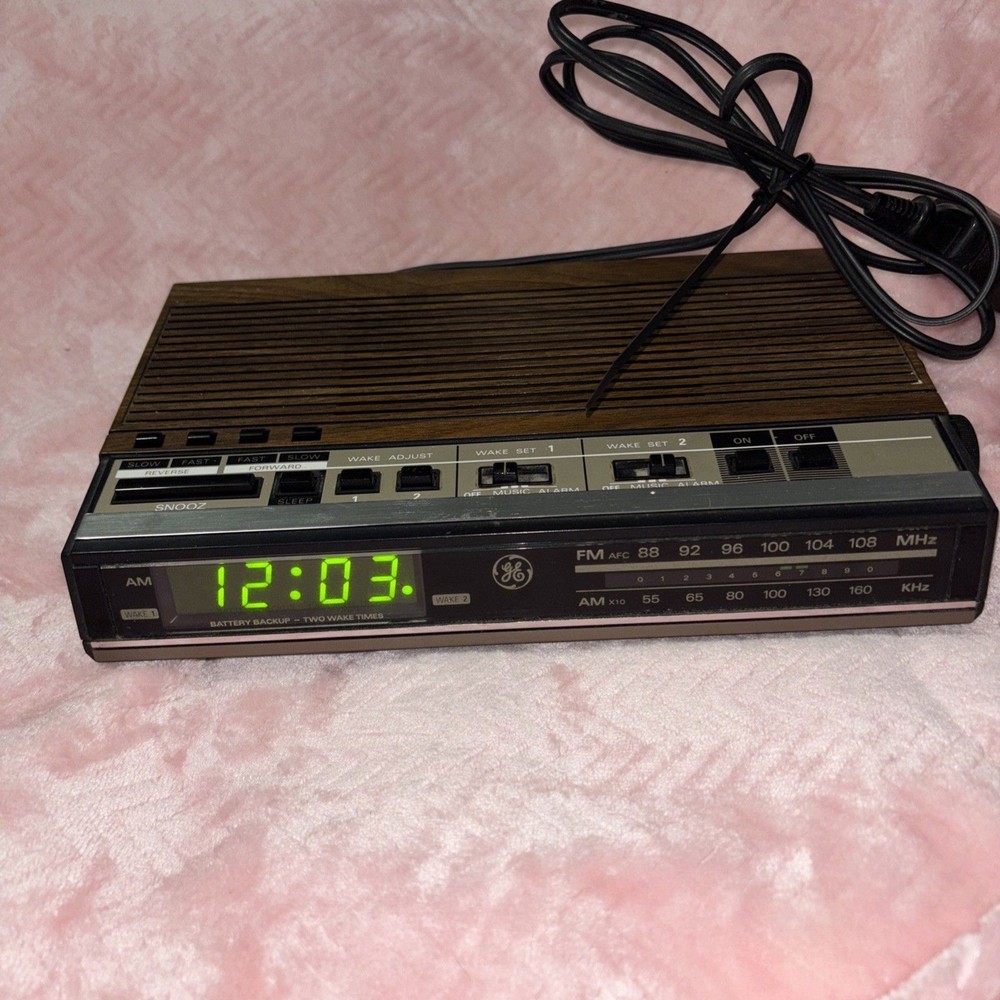General Electric 7-4638A Alarm Clock Radio/Tested/2 Alarms 10” X 2” Wood grain
