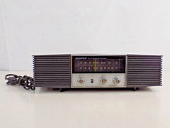 Vintage Lloyd’s AM/FM Solid State Dual Speaker Woodgrain Radio Model RR-6561