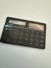 Casio Card FM Radio/Solar Calculator w/ headset (RD-90) 1988 Rare vintage Japan